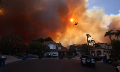 Des-panaches-de-fumee-sont-visibles-alors-qu-un-feu-de-broussailles-brule-a-Pacific-Palisades-en-Californie-le-7-janvier-2025-2009337